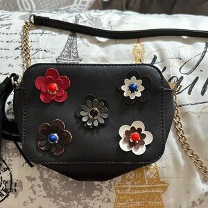 Olivia Miller Black Crossbody Bag with Floral Accents